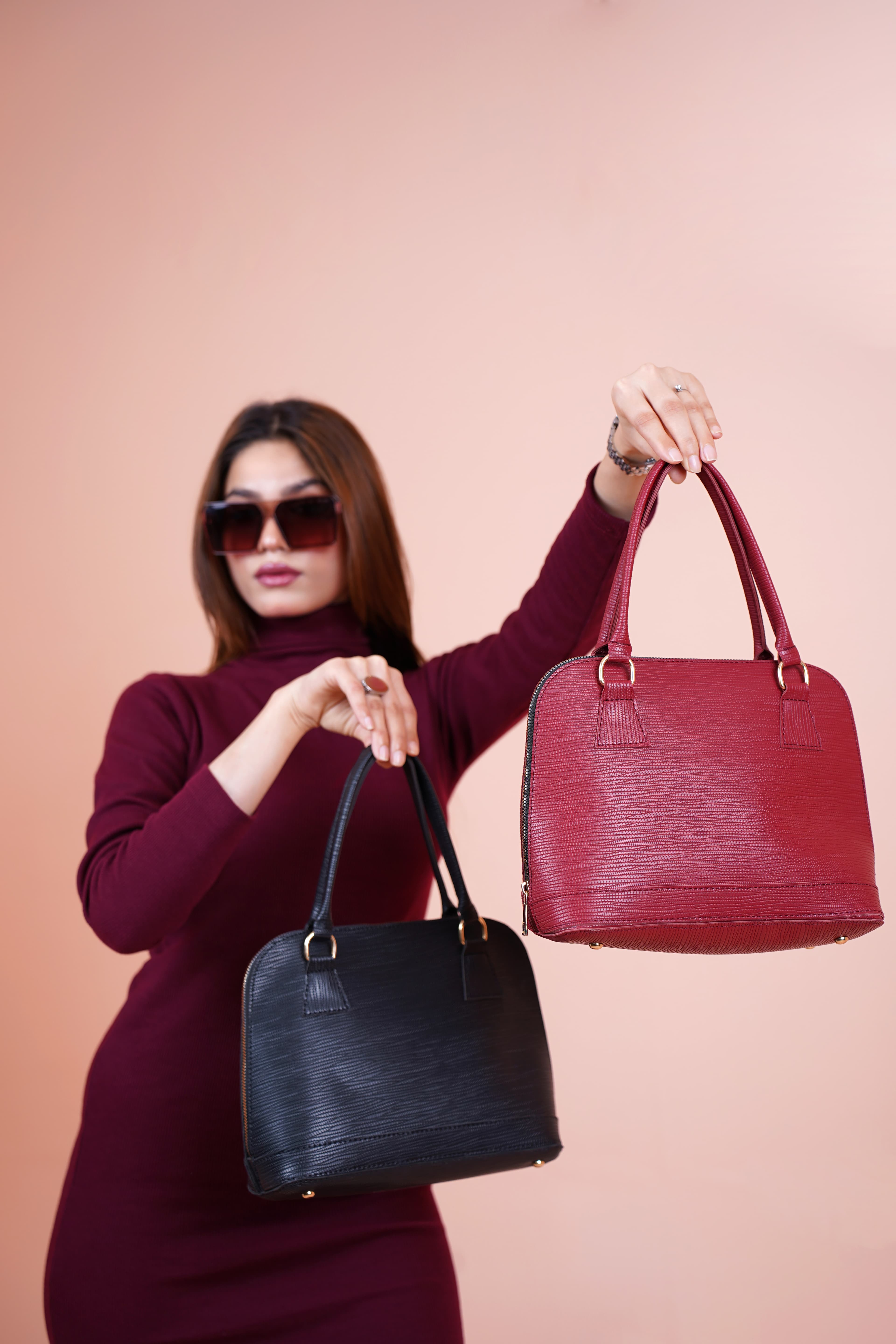 Woman with two handbags